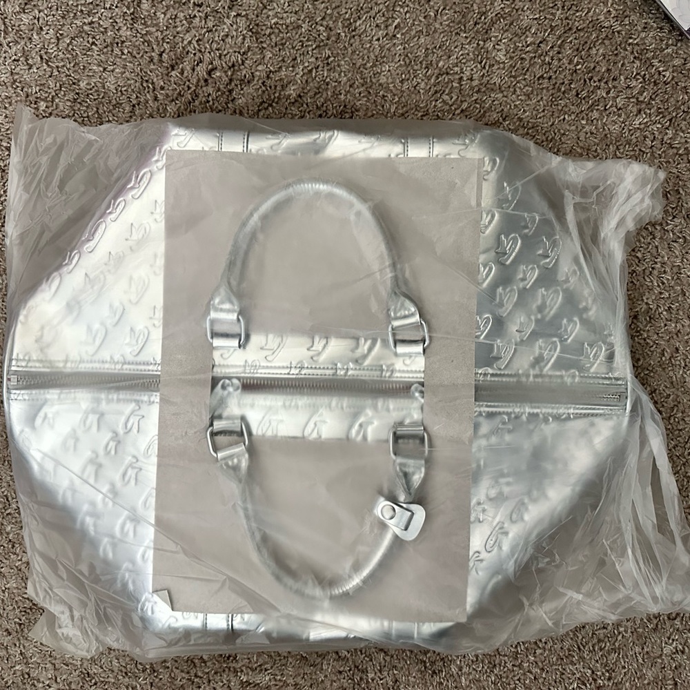 Glamaholic Lifestyle MONOGRAM DUFFLE BAG METALLIC SILVER